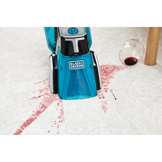 BLACKDECKER BHSB320JP carpet cleaner cleaning red wine spill on white carpet, front angle.