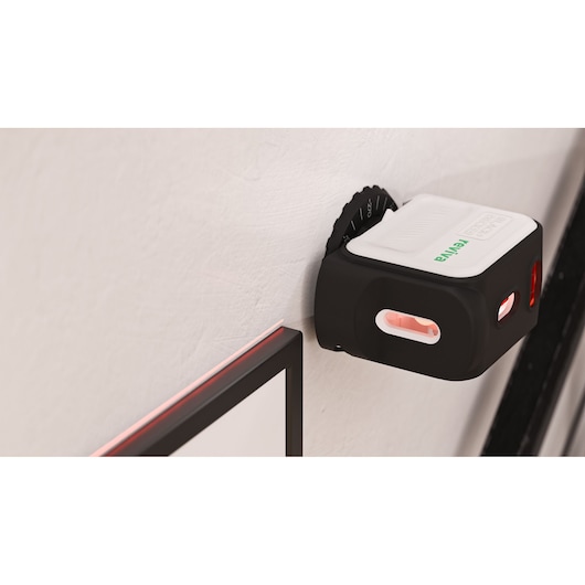 BLACKDECKER REVBDLL100 wall-mounted laser level in black and white, photo showing side angle.
